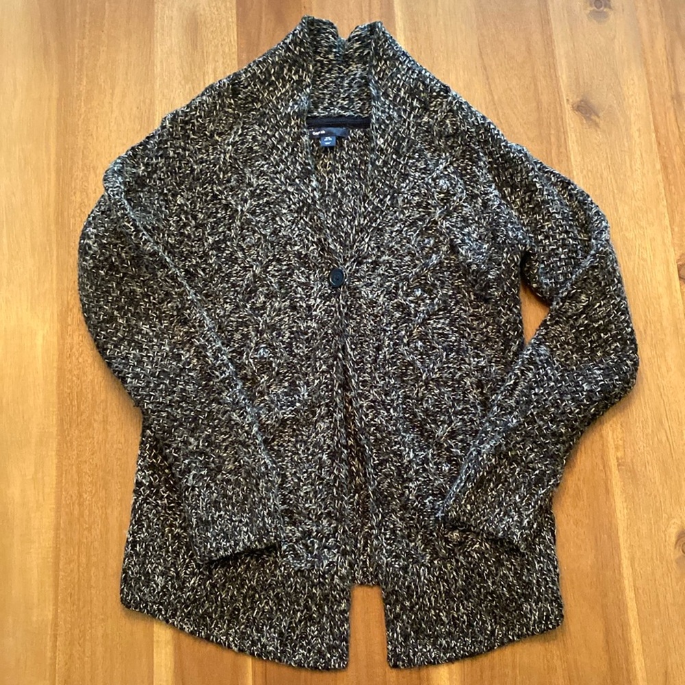 Black and white cable knit one button sweater. Excellent condition.